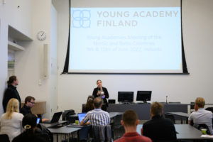 Chair of the YA Finland holding the opening statement, Jenni Raitoharju.CC: Sebastian Trzaska / Young Academy Finland