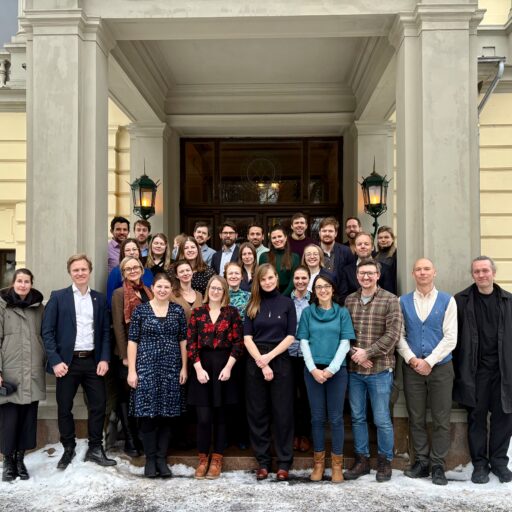 A picture of The Norwegian Young Academy on the stairs of The Norwegian Academy of Letters and Sciences at the annual winter gathering.